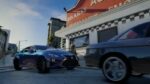 Customer cars parked outside the FiveM mechanic MLO auto body shop